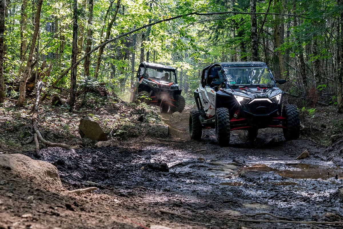 Side by sides on an off-roading trail in Maine
