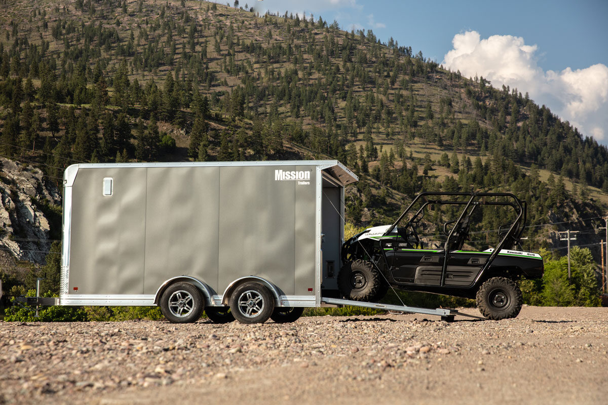 Unloading a UTV from an enclosed Pinnacle Series aluminum trailer