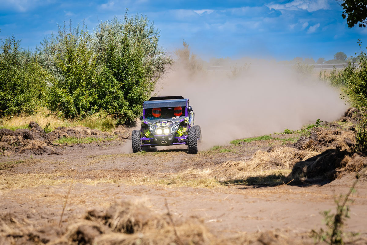 UTV racing on a dirt course 