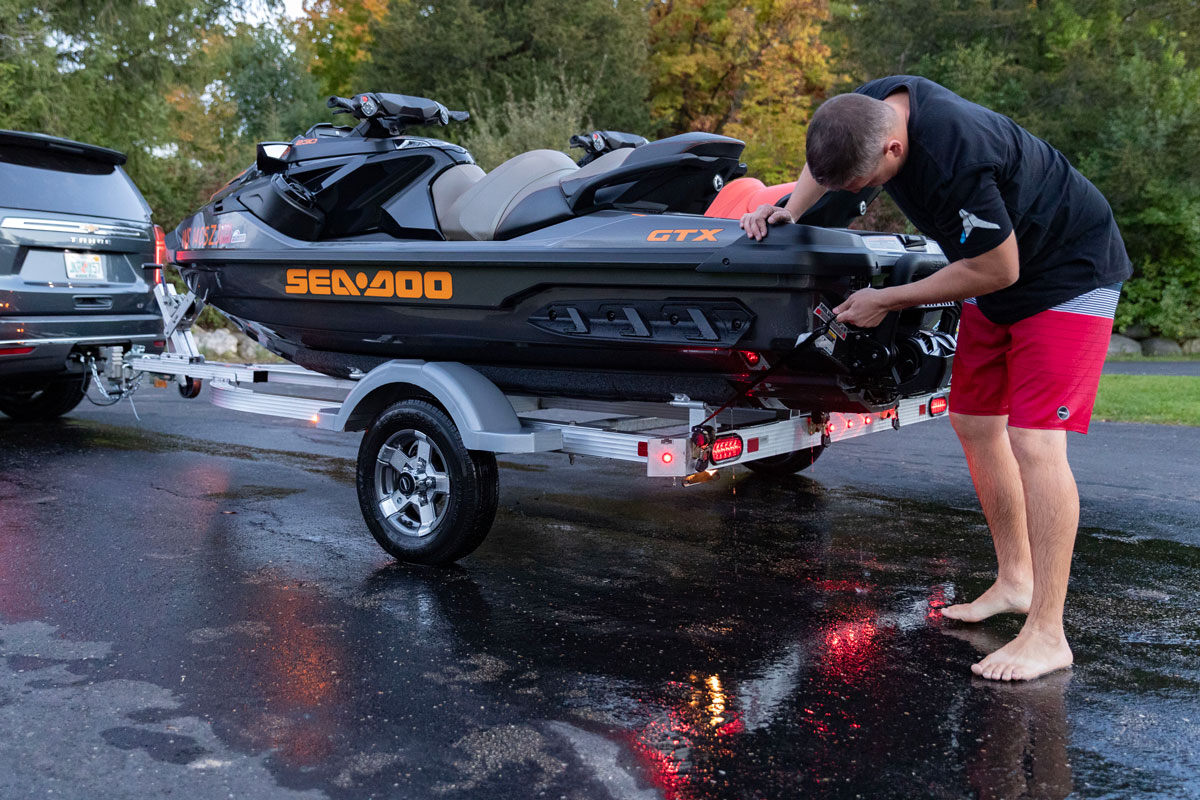 Securing a PWC to a two-place aluminum ELITE series PWC trailer by Triton using ratchet straps